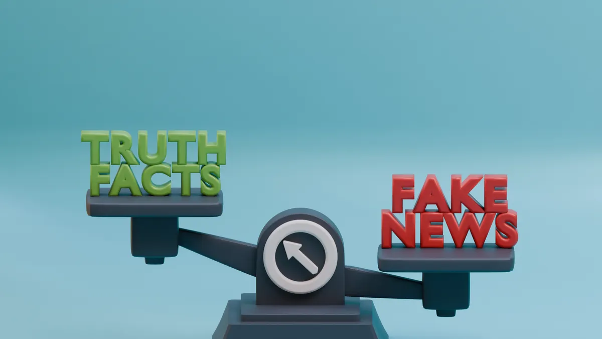 Truth vs fake news scales on a blue background