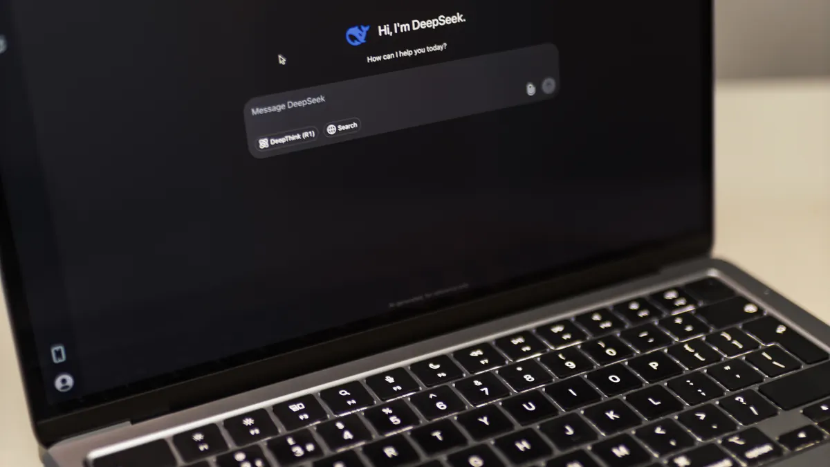Tech tool reviews for AI and writing software Tech tool reviews for AI and writing software — Laptop Displaying AI Conversation Interface
